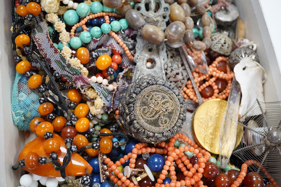 A mixed quantity of assorted jewellery and other items including carnelian agate, coral and amber necklaces, hair ornament, shells, spectacles, etc. Condition - poor to fair